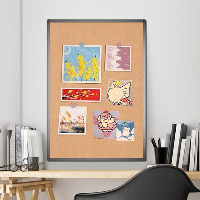 Cork notice board with black aluminum frame, sized 36x24 inches, ideal for educators to organize classroom materials and announcements effectively.